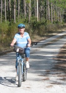 Peggy Biking down the Road Peggy Biking down the Road